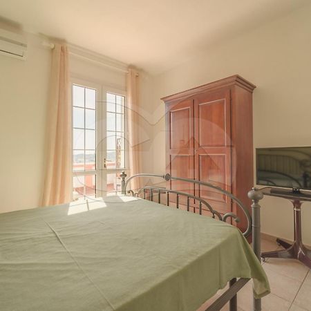 La Palazzina Nel Verde - Goelba Casa Alzi Екстериор снимка